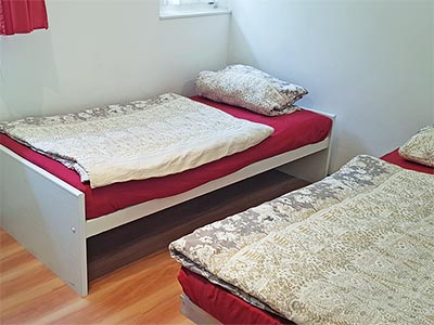 Wohnung Panorama: Drittes Schlafzimmer mit Einzelbetten