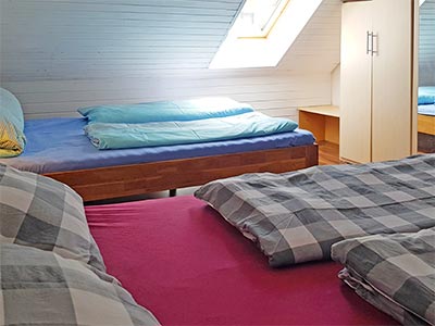 Wohnung Sunnyside: Schlafzimmer mit zwei Doppelbetten im 2. Stock